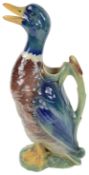 An early 20th century French pottery majolica novelty jug in the form of a duck