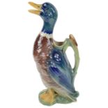 An early 20th century French pottery majolica novelty jug in the form of a duck