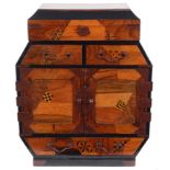 A late 19th century Japanese Meiji period Hakone wear parquetry table cabinet