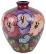 A modern Moorcroft Pottery 'Pansy' trial vase designed by Rachel Bishop