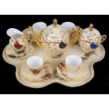 An early 20th century Limoges porcelain cabaret set