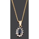 A delicate contemporary sapphire and diamond set pendant