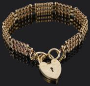 A 9ct gold three bar gate bracelet