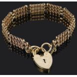 A 9ct gold three bar gate bracelet