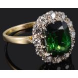 A tourmaline and diamond set cluster ring