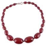 A single row cherry amber bead necklace