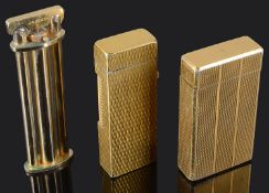 Three gold plated cigarette lighters