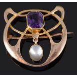 An attractive Arts & Crafts amethyst and blister pearl brooch