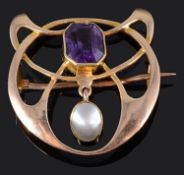 An attractive Arts & Crafts amethyst and blister pearl brooch