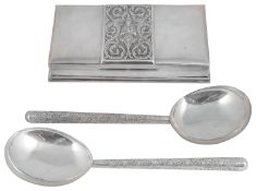 An early 20th century Thai silver table cigarette box and a pair of Sri Lankan white metal servers