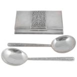 An early 20th century Thai silver table cigarette box and a pair of Sri Lankan white metal servers