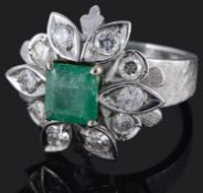 A large Continental emerald and diamond set dress ring