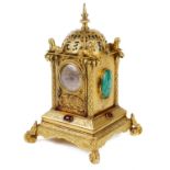 A Victorian small gilt brass Renaissance style clock