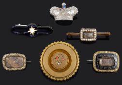 Three Georgian mourning brooches together with four Victorian brooches