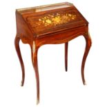 A late 19th century Fr. Louis XV style rosewood and marquetry inlaid bureau de dame