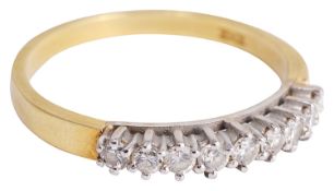 A Continental diamond and 18ct gold half eternity ring