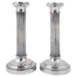 A pair of early 20th century Dutch .833 silver fluted column candlesticks