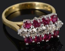 A contemporary ruby and diamond set dress ring by T.O'D Jewels