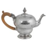 A George II silver pear shaped teapot