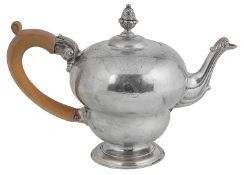 A George II silver pear shaped teapot