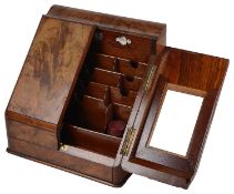 A Victorian figured walnut table top stationary cabinet