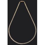 A Continental contemporary flat curb link gold neck chain