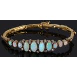 An attractive Edwardian opal and diamond set bracelet