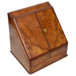 A mid Victorian burr walnut table top stationary cabinet
