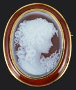 An attractive contemporary carved hardstone agate portrait pendant brooch