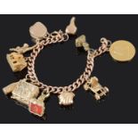 A 9ct gold curb link charm bracelet