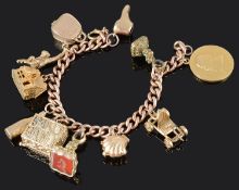 A 9ct gold curb link charm bracelet