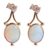 A pair of attractive contemporary opal and diamond earrings