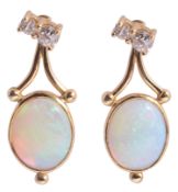 A pair of attractive contemporary opal and diamond earrings