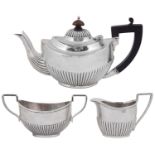 An Edward VII matched three piece silver bachelors tea service