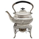 An Edwardian silver kettle on stand with spirit burner