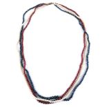 An attractive sapphire, ruby and cultured pearl necklace