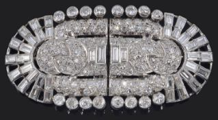 A large Continental Art Deco two piece diamond set dress clip brooch