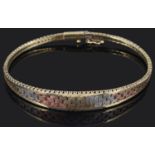 A contemporary three colour gold Italian woven gold bracelet