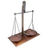 A large set of late 19th century brass and copper balance scales or confectioner's scales