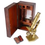 A compound monocular brass microscope by Nachet et Fils
