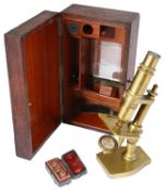 A compound monocular brass microscope by Nachet et Fils