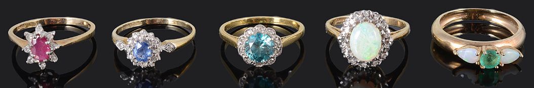 A blue zircon and diamond cluster ring and four other gem set dress rings