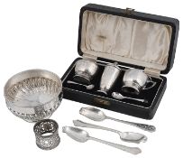 A Vict. silver sugar bowl, George VI Art Deco silver three piece cruet set and other silver items