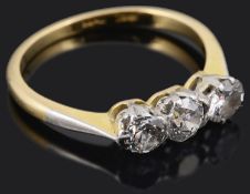 A three stone diamond set ring