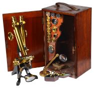 A late 19th century Henry Crouch lacquered brass binocular microscope