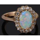 An attractive 15ct gold Edwardian opal and diamond set cluster ring
