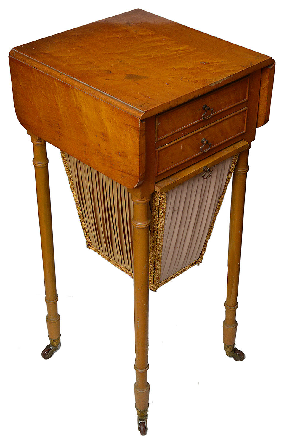 An early Victorian satinwood work table