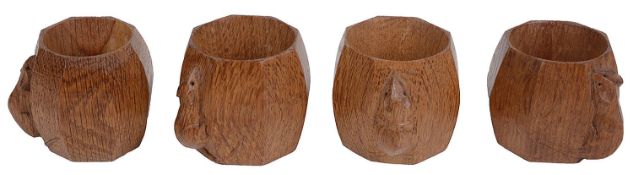 A set of four Robert 'Mouseman' Thompson of Kilburn octagonal oak napkin rings