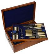 An early 20th century oak cased canteen twelve setting canteen of EPNS Old English pattern cutlery