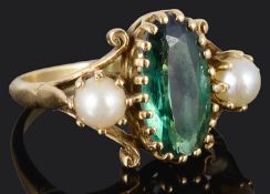 An attractive tourmaline and pearl ring